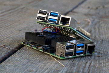 Two Raspberry Pi 4B Microcomputers stacked on each other outdoors for electrical engineering micro...