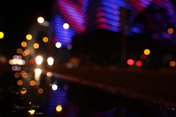 Blurred view of cityscape with bokeh effect. Night life