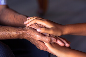 The asian old woman's hand was alone. Grandma's hands and grandchildren's