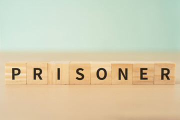 囚人・捕虜のイメージ｜「PRISONER」と書かれたブロック
