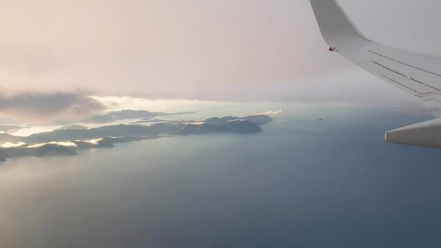 Flying over the Picton and the Marlborough Sounds in South Island of New Zealand, Aotearoa on a cloudy day