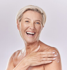 Sunscreen, skincare and body care of senior woman applying cream to skin with a studio portrait. Skin care, clean and hygiene model with anti aging wrinkles or moisturizing product for aging wellness