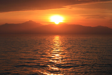 Beautiful sunny sky and clouds over the horizon. Sunset background.
