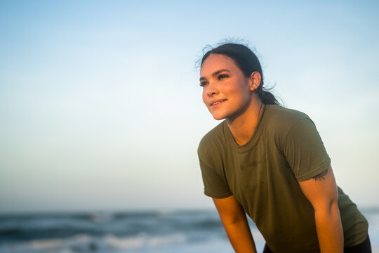 Marine veteran trains every morning on the beach to stay in shape just like when she was on active duty.