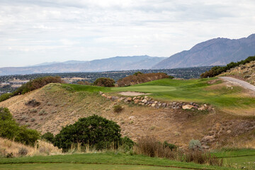 Fototapeta na wymiar Golf Course green on a hill