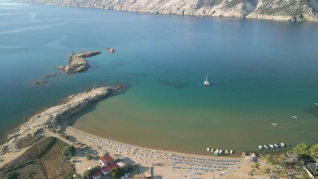 Lopar aerial view, travel holiday destination with sandy beach and pristine sea water, traditional town on Adriatic coastline, aerial drone view