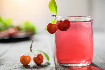 Cherries drink with fresh cherry, Cherry juice, on wood background