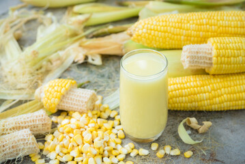 Sweet corn juice ,corn milk, Fresh corn, healthy organic food, bio nutrition, on wood background