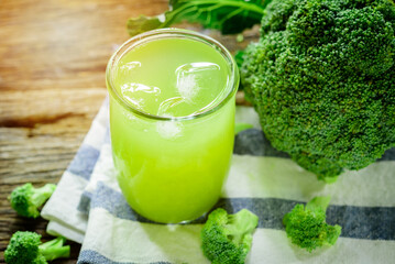 broccoli Healthy drink, Glass of broccoli juice, on wood background