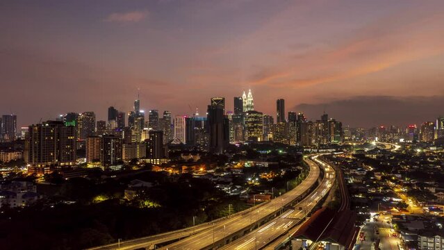 hyper lapse of highway and urban during sunset . Kuala Lumpur is a metropolitan diversity contrast and culture.