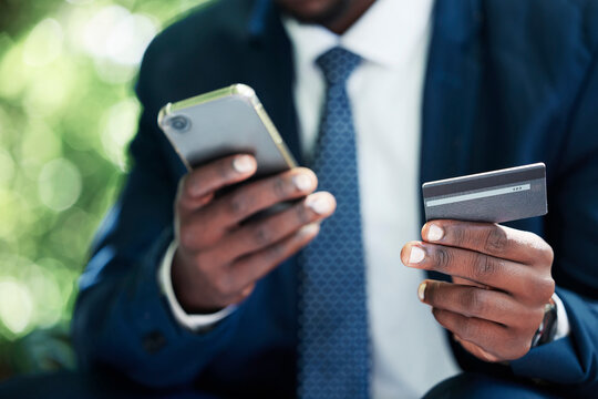 Online, hands and banking of business man in ecommerce with digital purchase on phone with credit card. Businessman advertising at work in marketing, shopping and internet with mobile technology.