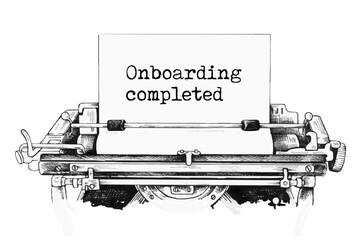 Onboarding completed symbol. Words Onboarding completed typed on retro typewriter. Business and onboarding completed concept.