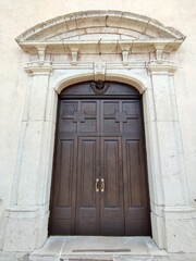Fototapeta na wymiar Mirabello Sannitico - Entrata della Chiesa di Santa Maria Assunta