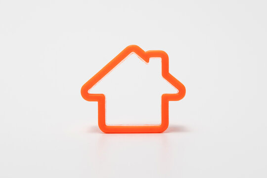 Orange home icon symbol. House icon