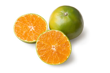 Fototapeta na wymiar Clementine or tangerine orange fruit and cut in half sliced