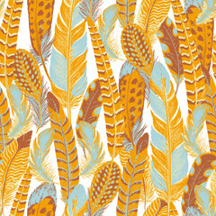 Seamless pattern of colorful feathers. Yellow, blue, brown colors. Brush and paint texture