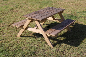 Bench for rest in the city park.