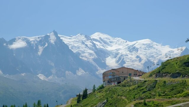 The station of flagere and behind the view of mont blanc in a sunny day,  in the valley of chamonix, in france. Static shoot.