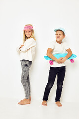 Fototapeta premium Portrait of two young smiling kids casual street style lifestyle childhood