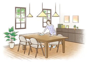 テーブルを拭く中年女性