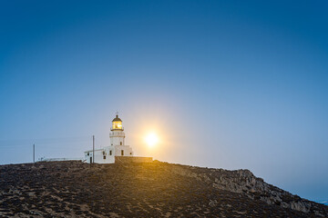 Fototapeta na wymiar Armenistis Lighthouse, in Mykonos, Aegean Sea, Greece.