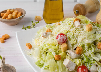 caesar salad with chicken and tomatoes