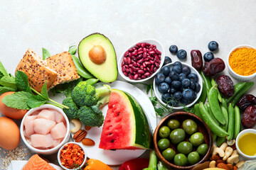 Healthy food assortment on light background.