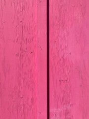 A wooden wall painted pink 