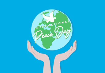 International peace day background on September 21 with globe earth and pigeon on opened hand.