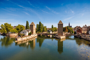 Fototapeta na wymiar barrage vauban and Strasbourg Cathedral with Ill River in Alsace
