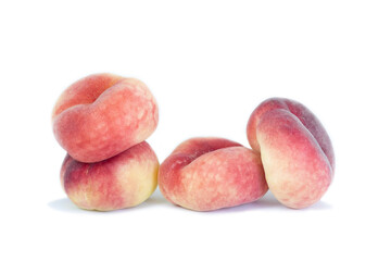 Donut peach on white background. Flat peach, doughnut peach, donut peach or Saturn peach.