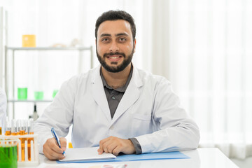Man scientist working in the laboratory. Specialist working with biotechnology research
