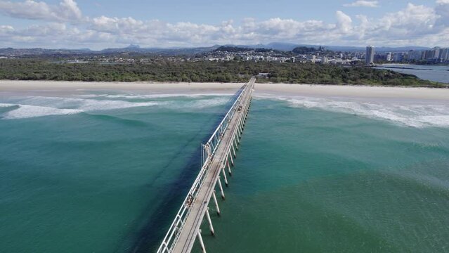 Tweed Sand Bypass On TSB Jetty At Letitia Beach. Sand Pumping On Tweed Coast In NSW, Australia. aerial drone pullback