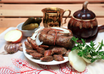 Sausages laid out on decorative dishes