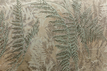 Background texture of wallpaper in the form of khaki fern leaves