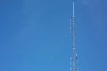 blue sky background communication towers
