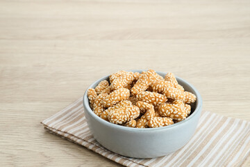 Kue Keciput, Indonesian traditional snack made from glutinous rice flour, eggs, sugar and sprinkled with sesame seed.
