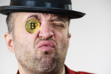 Man having bitcoin in eye