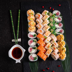 tasty sushi on the black background