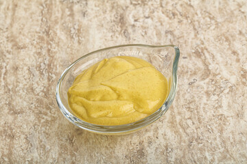 Organic mustard sauce in the bowl