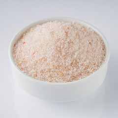 pink Himalayan salt on a white background