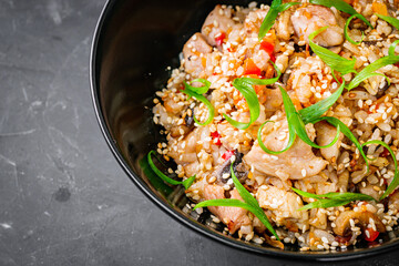 traditional chinese fried rice on black background