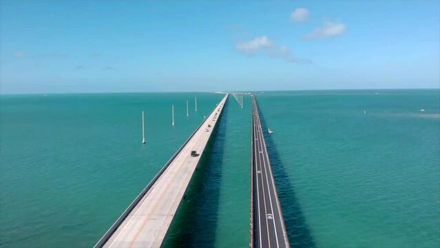 Slowly rising drone shot of 7 mile bridge in the Florida keys with two bridges