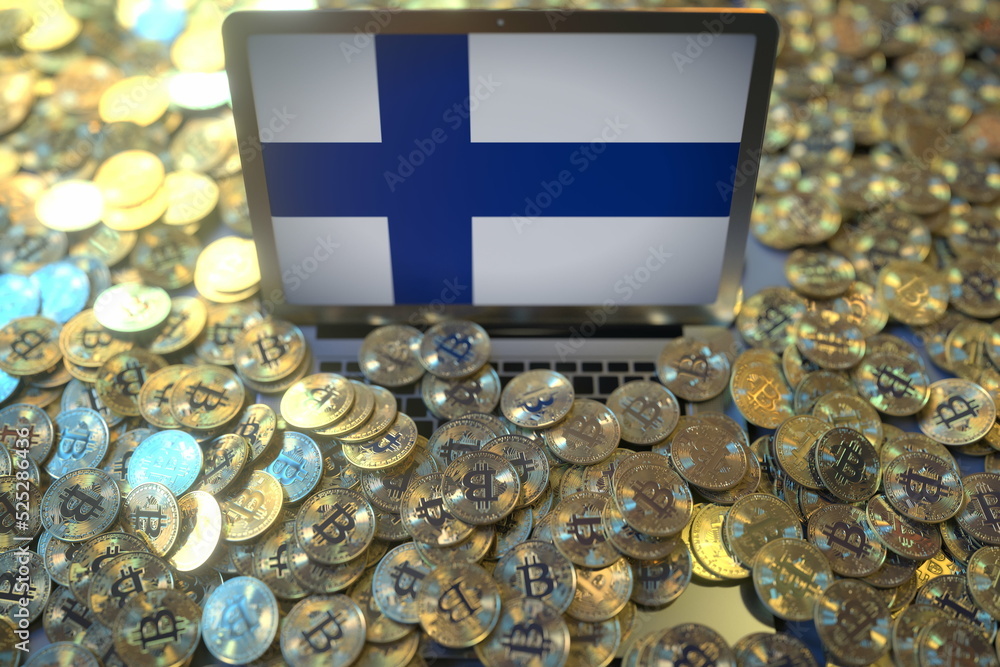 Aufkleber computer with flag of finland and pile of bitcoins. national regulations and cryptocurrency mining c