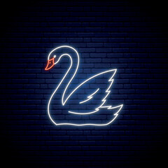 Neon Swan icon. Elegant white swan emblem in neon style. Bright light signboard. Vector illustration. © greens87
