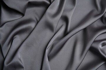 Obraz premium Texture of delicate black silk as background, top view