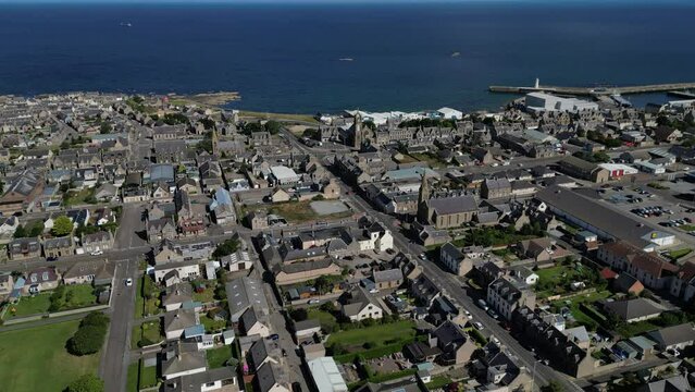 4K: Aerial Drone Video of Buckie, in Moray, Scotland UK. Circular shot of the town. Stock Video Clip Footage.  