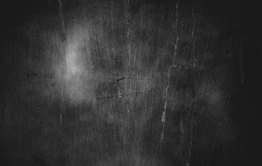 Obraz na płótnie Canvas Slightly light black concrete cement texture for background. Dark grunge distressed with scratches, Scary dark walls overlay