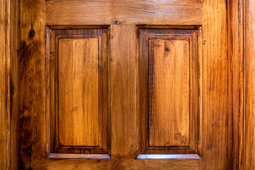 Wood texture of a carved varnished door. Pattern concept.