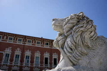 lion head made out of marble in  Massa, Italy